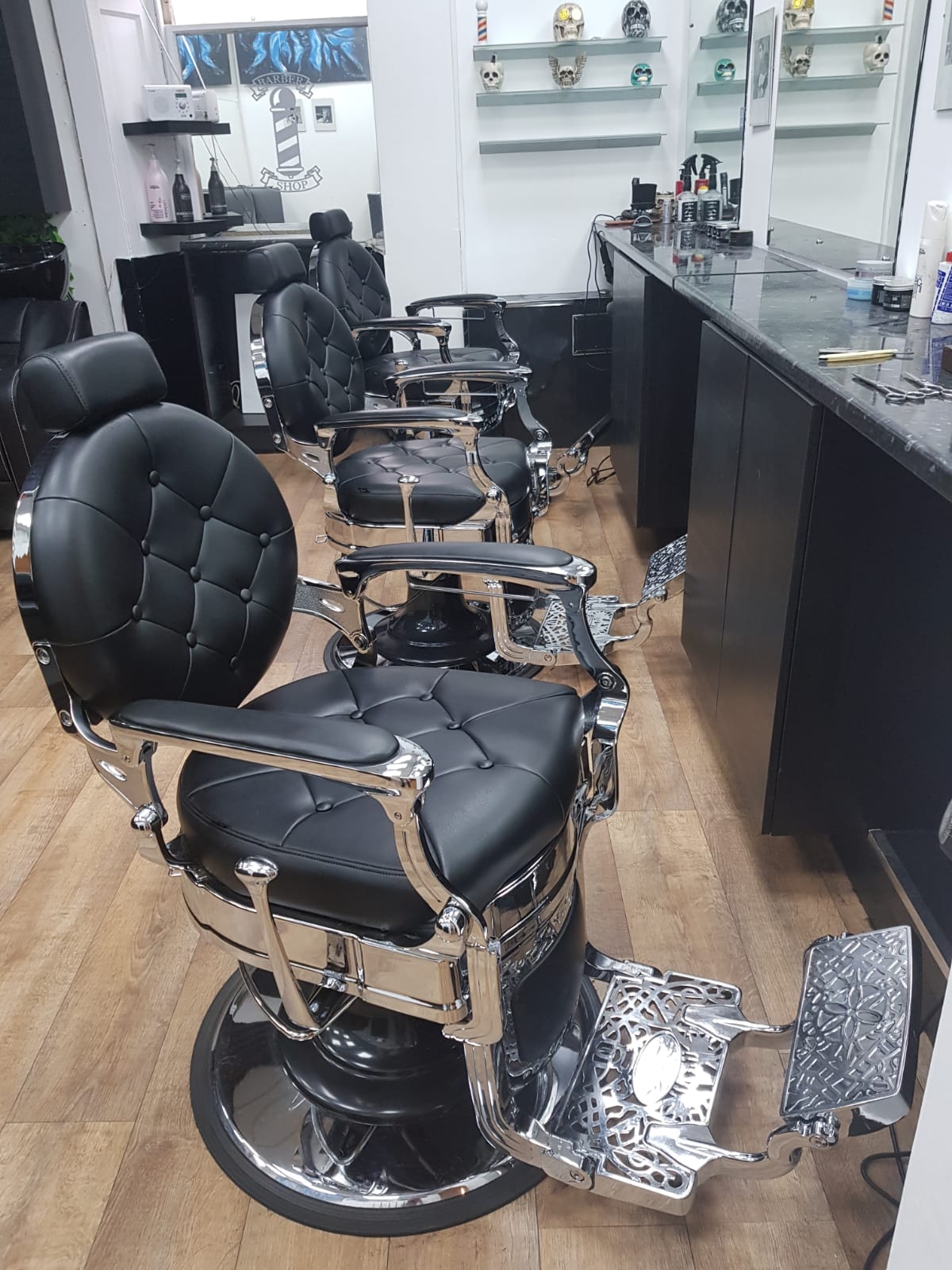 The team at Sauchiehall Barbers in the Sauchiehall Street shop