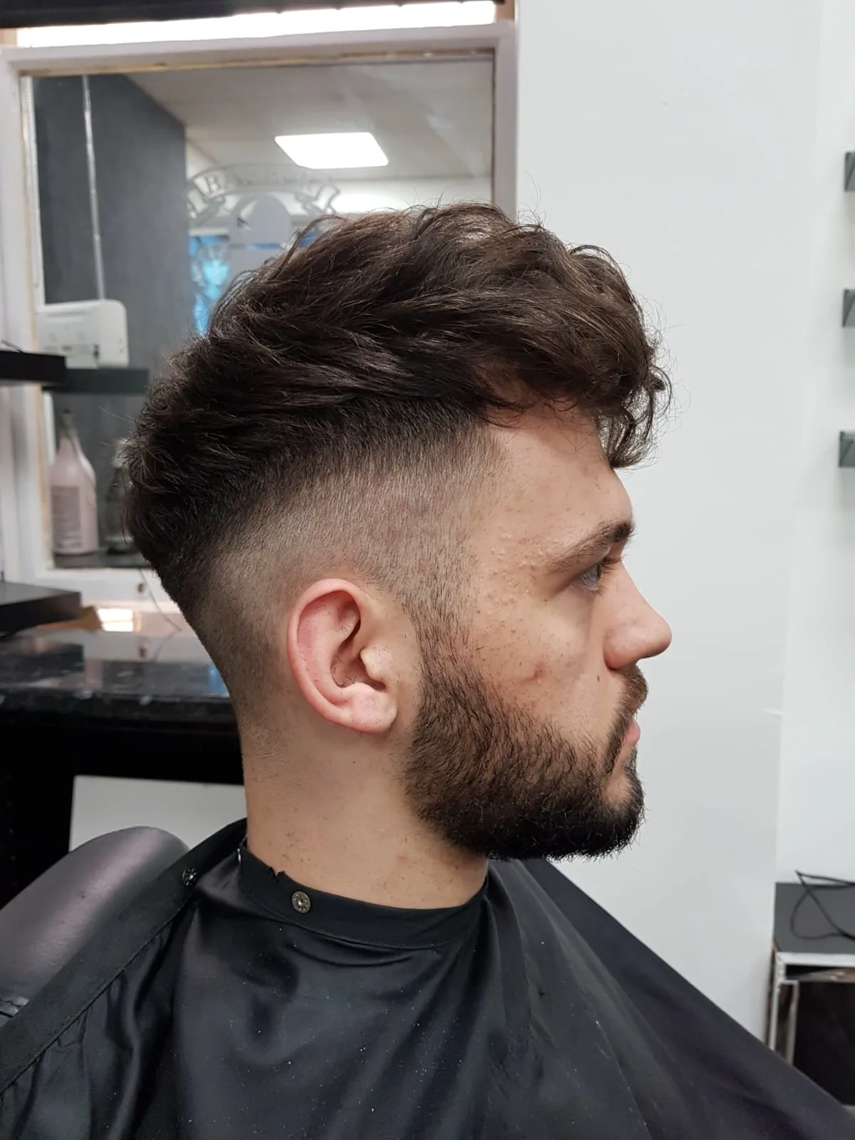 The same client after a textured fade and tidy beard trim at Sauchiehall Barbers