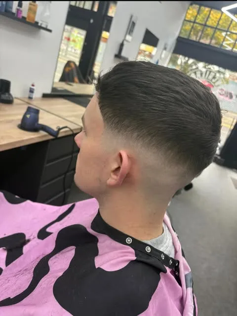 Classic short back and sides with a low fade at Sauchiehall Barbers